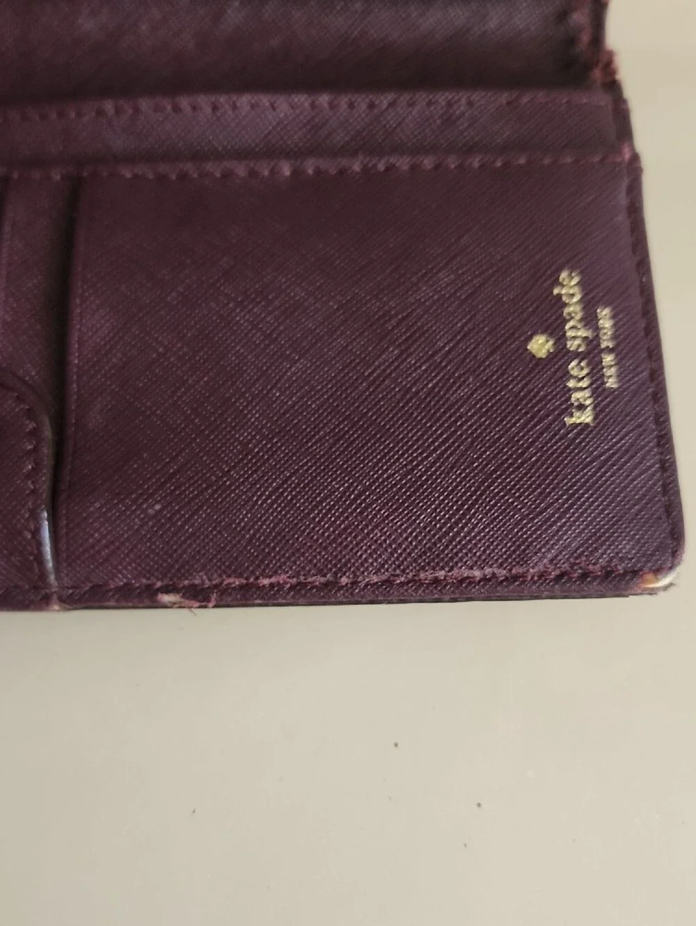 kate spade Plum Textured Saffiano Continental Wallet with Gold Logo
